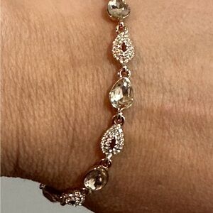 Intricate Silver Bracelet with Sparkling Teardrop Links